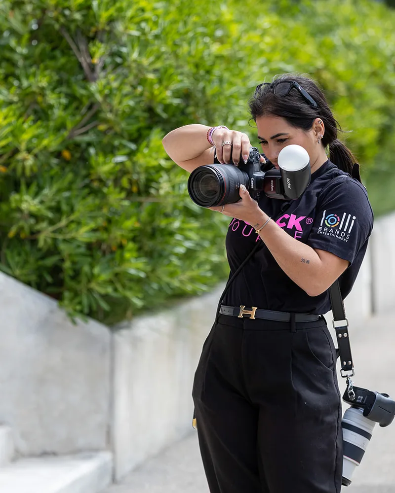A Biohack Yourself photographer in the shirt, shooting on the carpet at our Cannes premiere