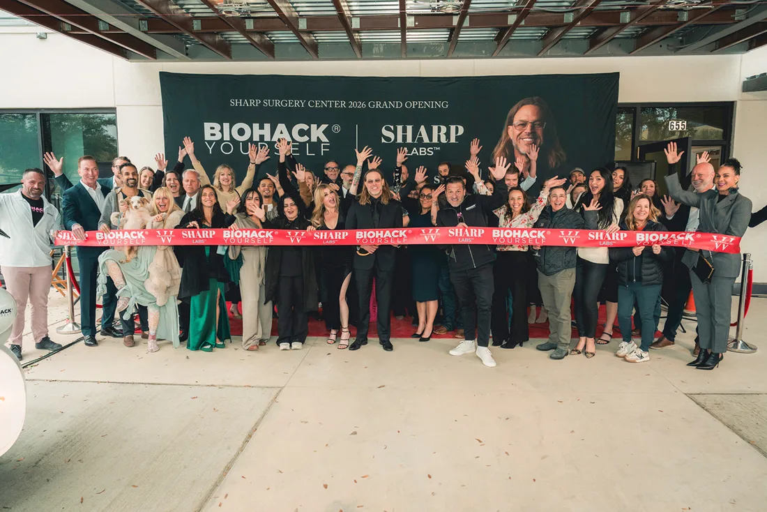 The ribbon cutting at a client grand opening, activated by Biohack Yourself
